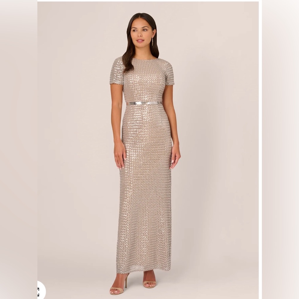 SEQUIN SHORT SLEEVE COLUMN GOWN WITH EMBELLISHED WAIST IN SILVER NUDE